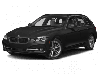 Berline BMW noire vue de trois quarts avant.